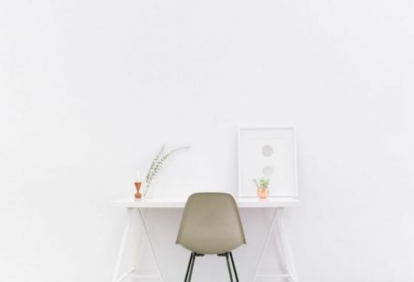 Clean Desk - white wooden table near brown chair