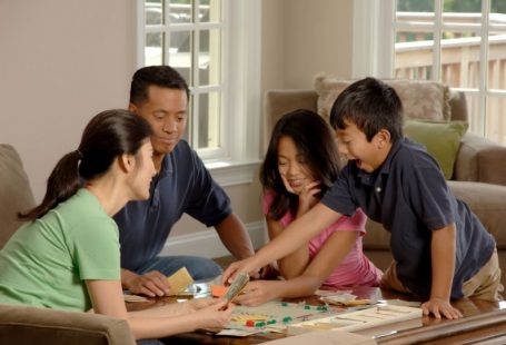 Family Time - group of people beside coffee table